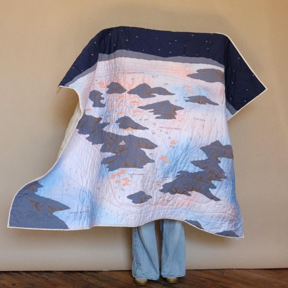 Holding up the Joshua Tree Quilt
